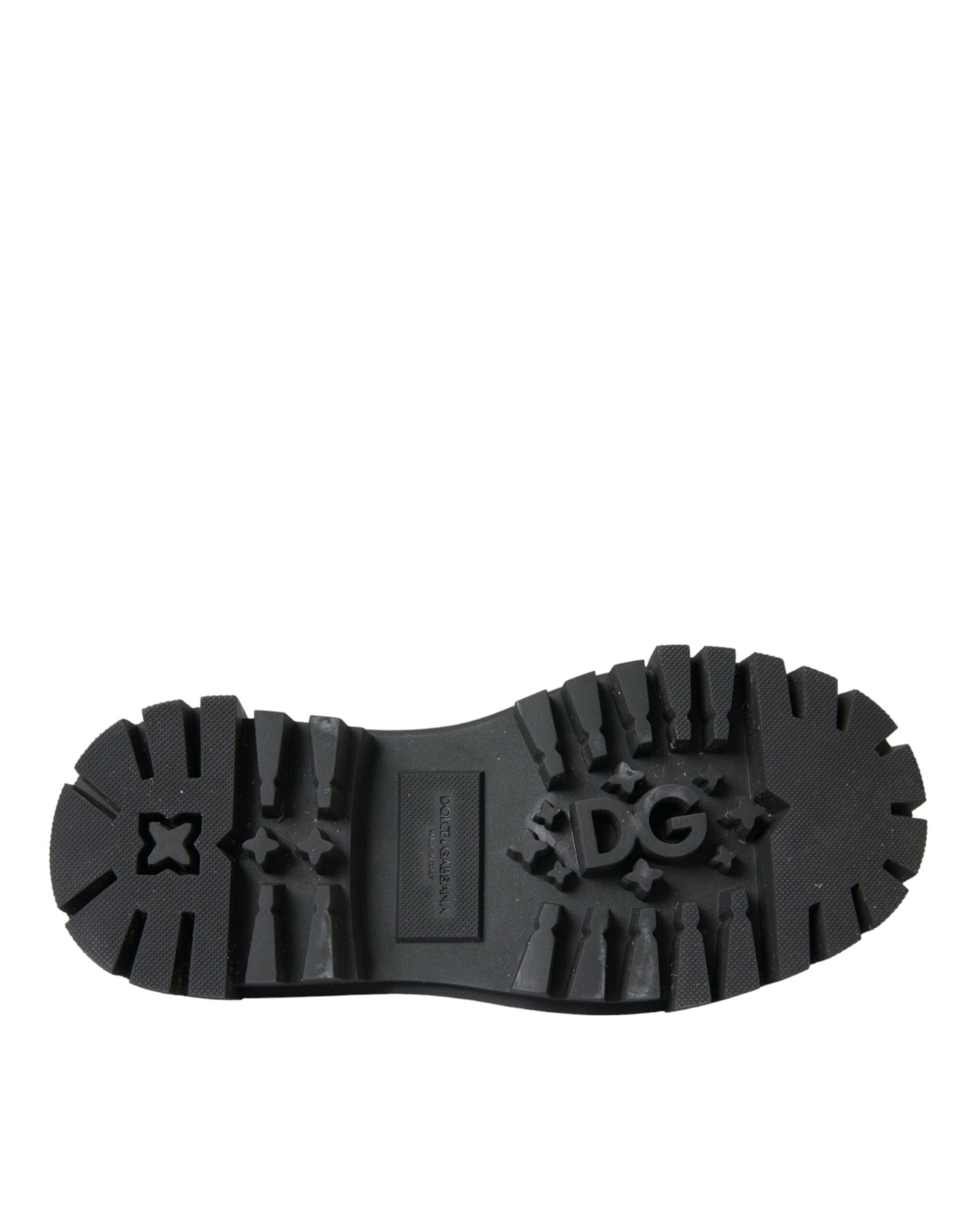 Black rubber boot with a white logo on the side
