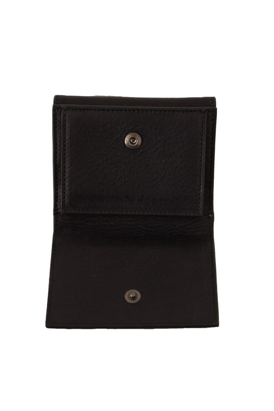 Black leather wallet with silver button closure