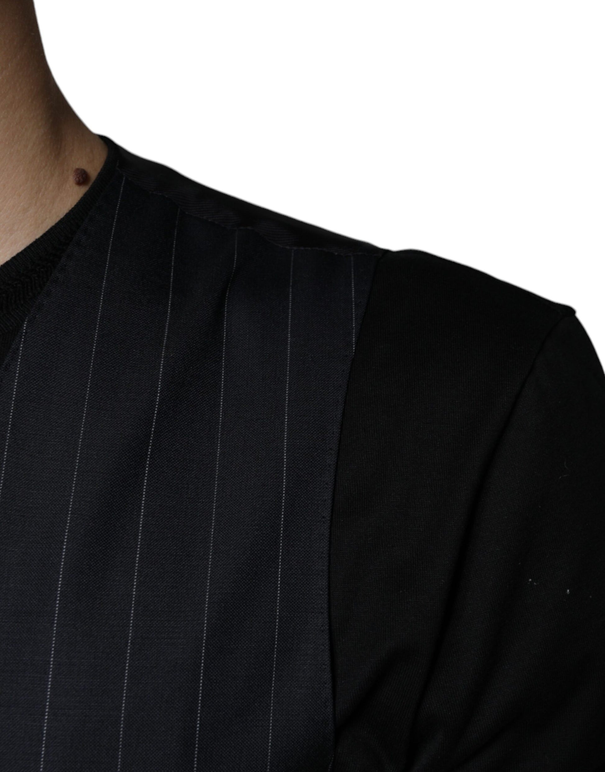 A black leather waistcoat with a pinstripe design
