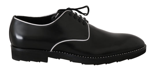 Black lace-up dress shoe with white stitching and sole