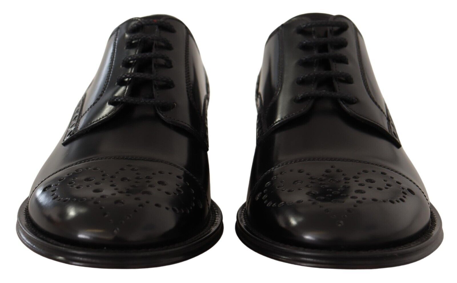 Pair of black leather dress shoes with laces and perforated detailing