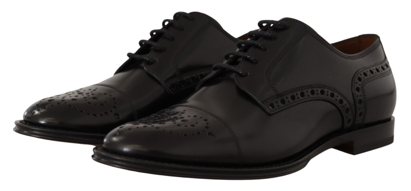 Pair of black leather shoes with laces and a small heel
