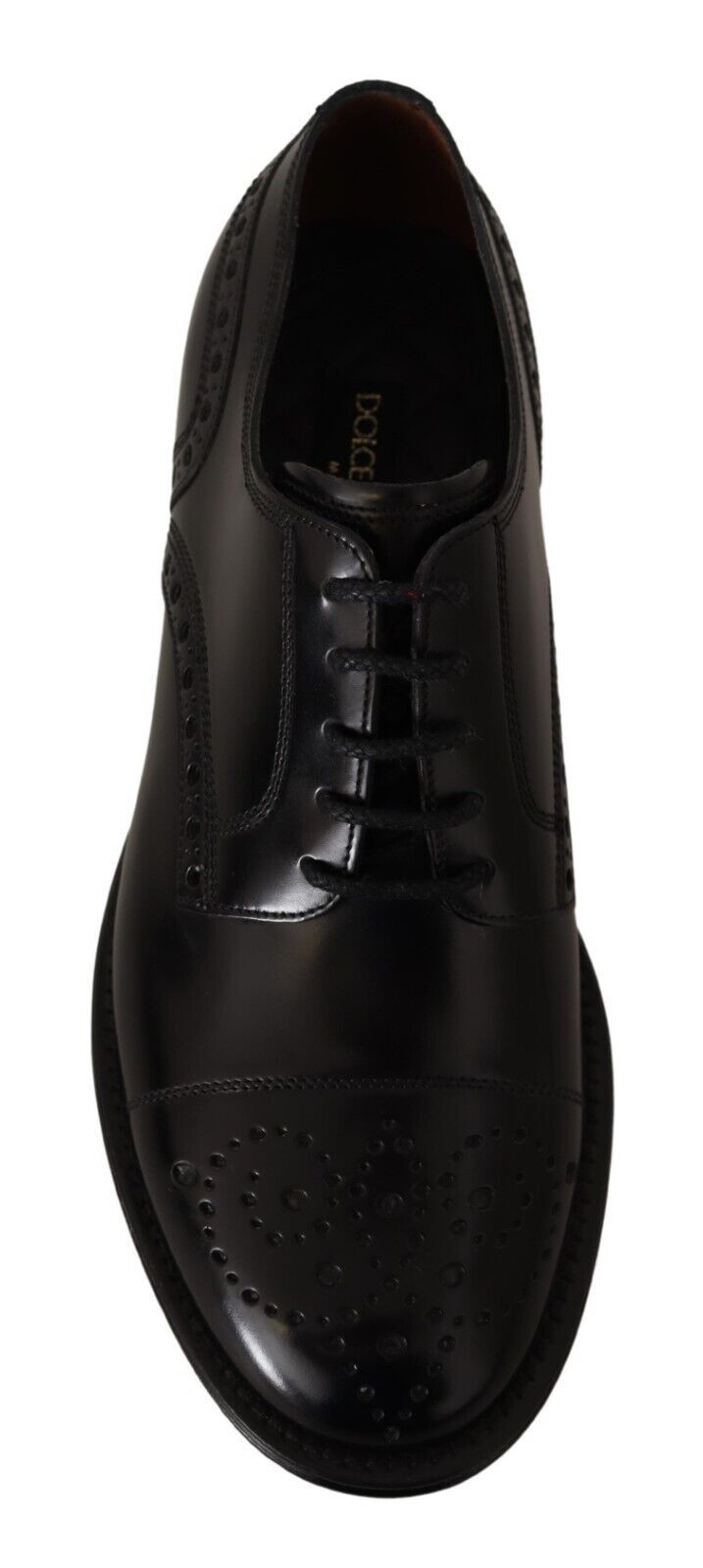 Black leather dress shoe with laces and perforated design on sole