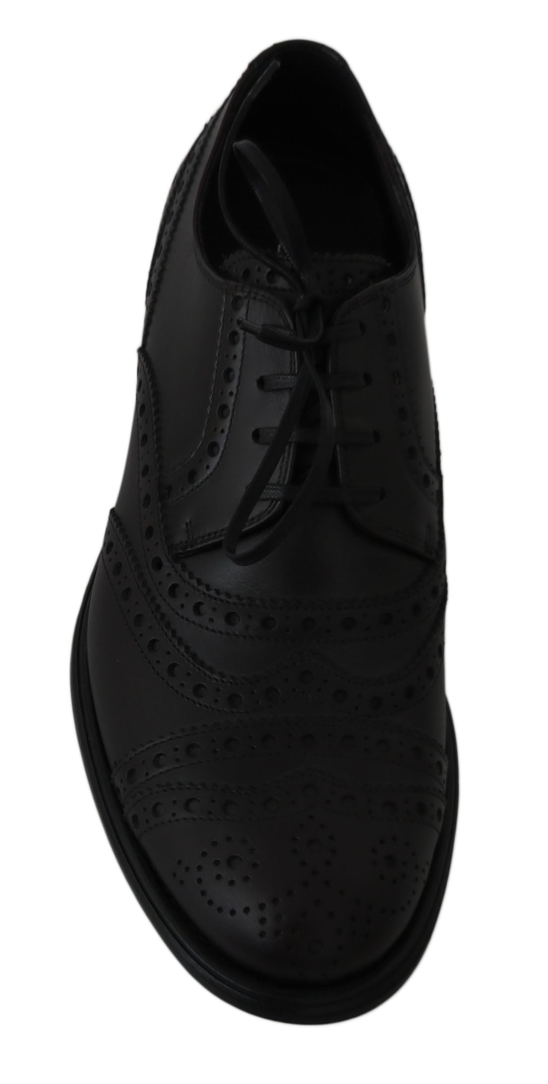 Black dress shoe with laces and perforated design on side
