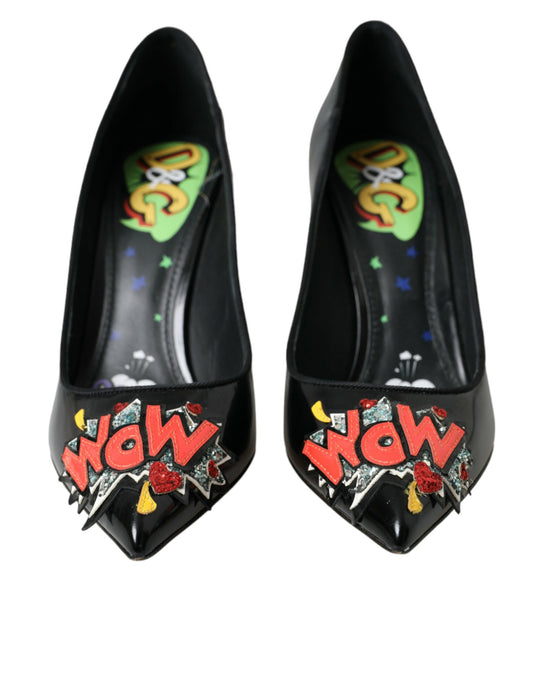 Pair of black shoes with colorful embellishments on heels