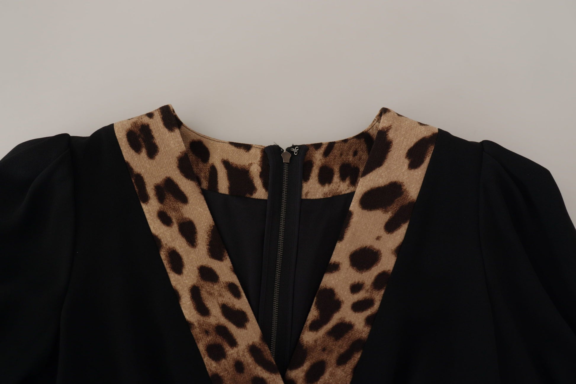 Leopard print dress with black zipper detailing