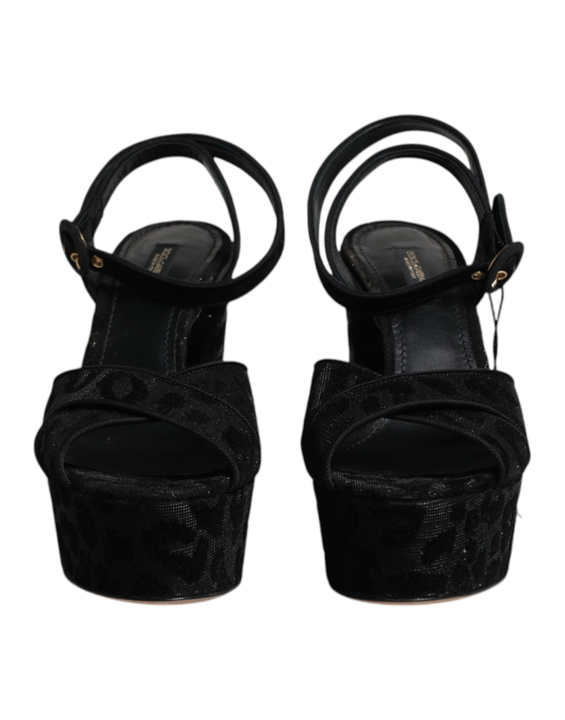 Pair of black glittery high heel shoes