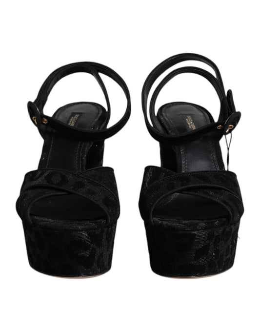 Pair of black glittery high heel shoes