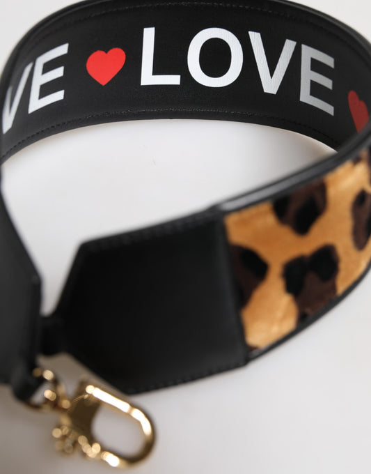Black leather dog collar with cheetah print trim and a "We Love Love" message