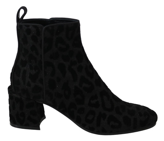 Black suede boot with animal print pattern on side