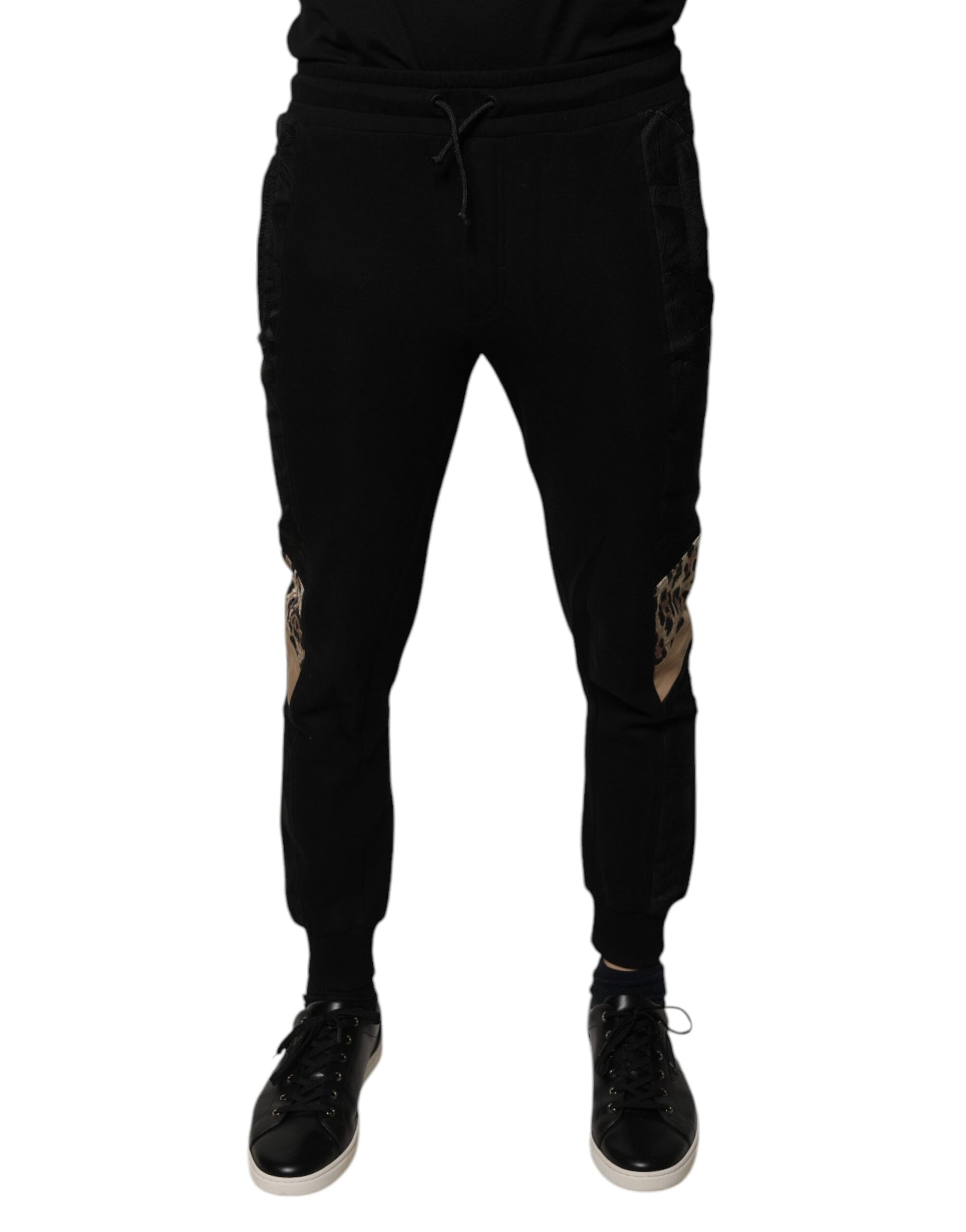 Black sweatpants with white stripe on side