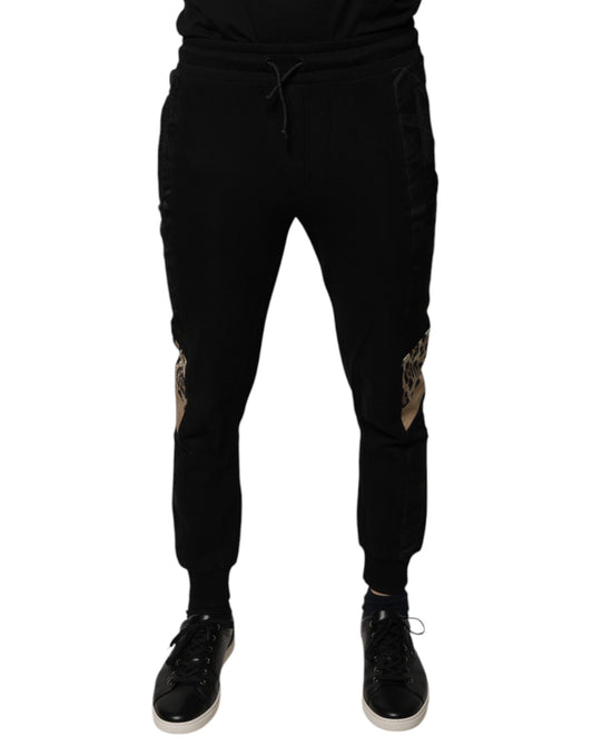 Black sweatpants with white stripe on side