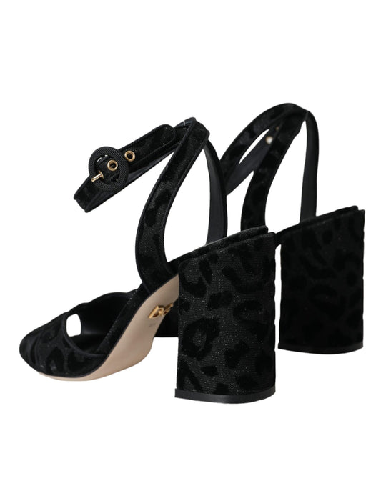 High heel shoes with black straps and gold accents