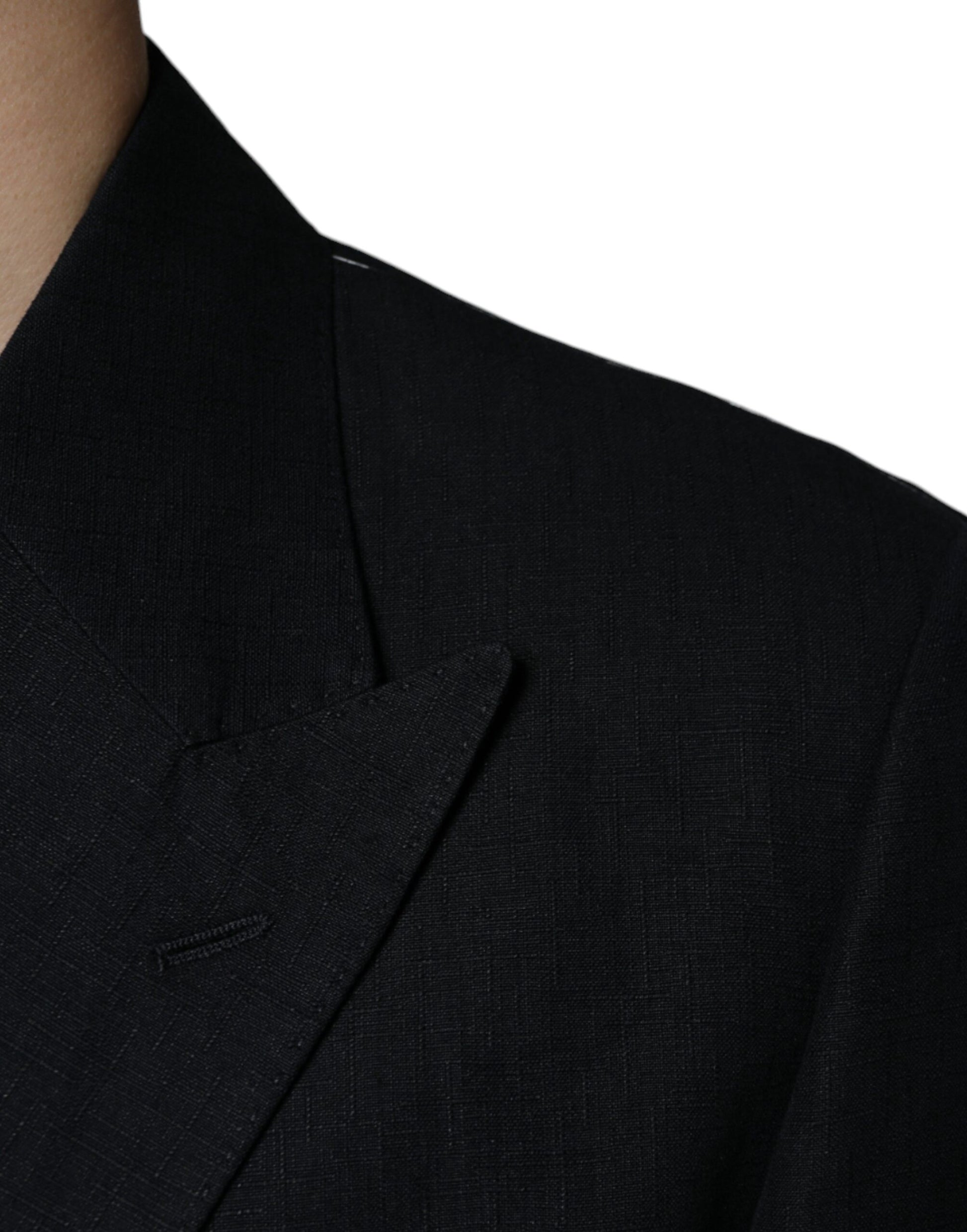 A black double-breasted blazer with a linen texture
