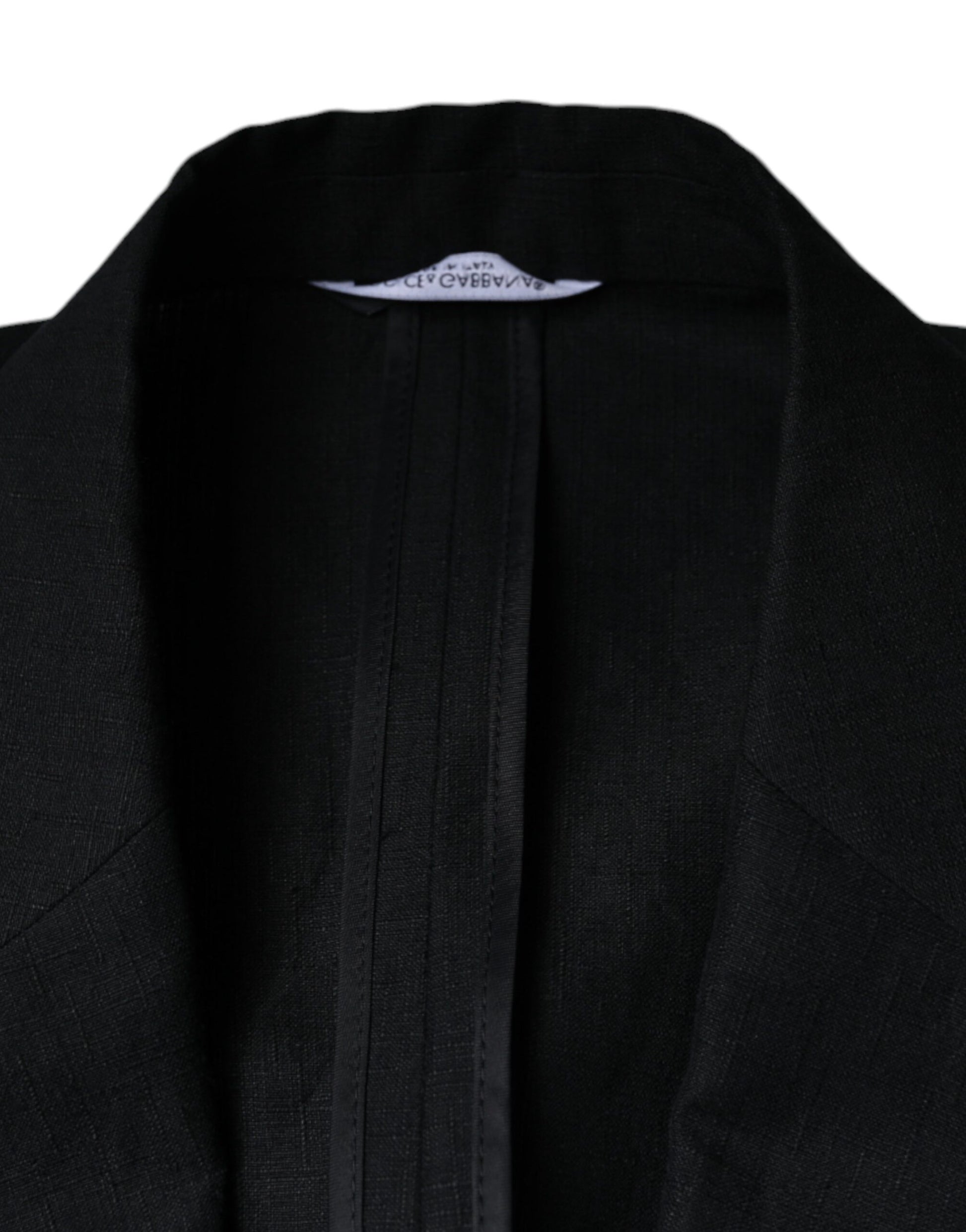 A black double-breasted blazer with a linen texture, featuring a zippered front closure