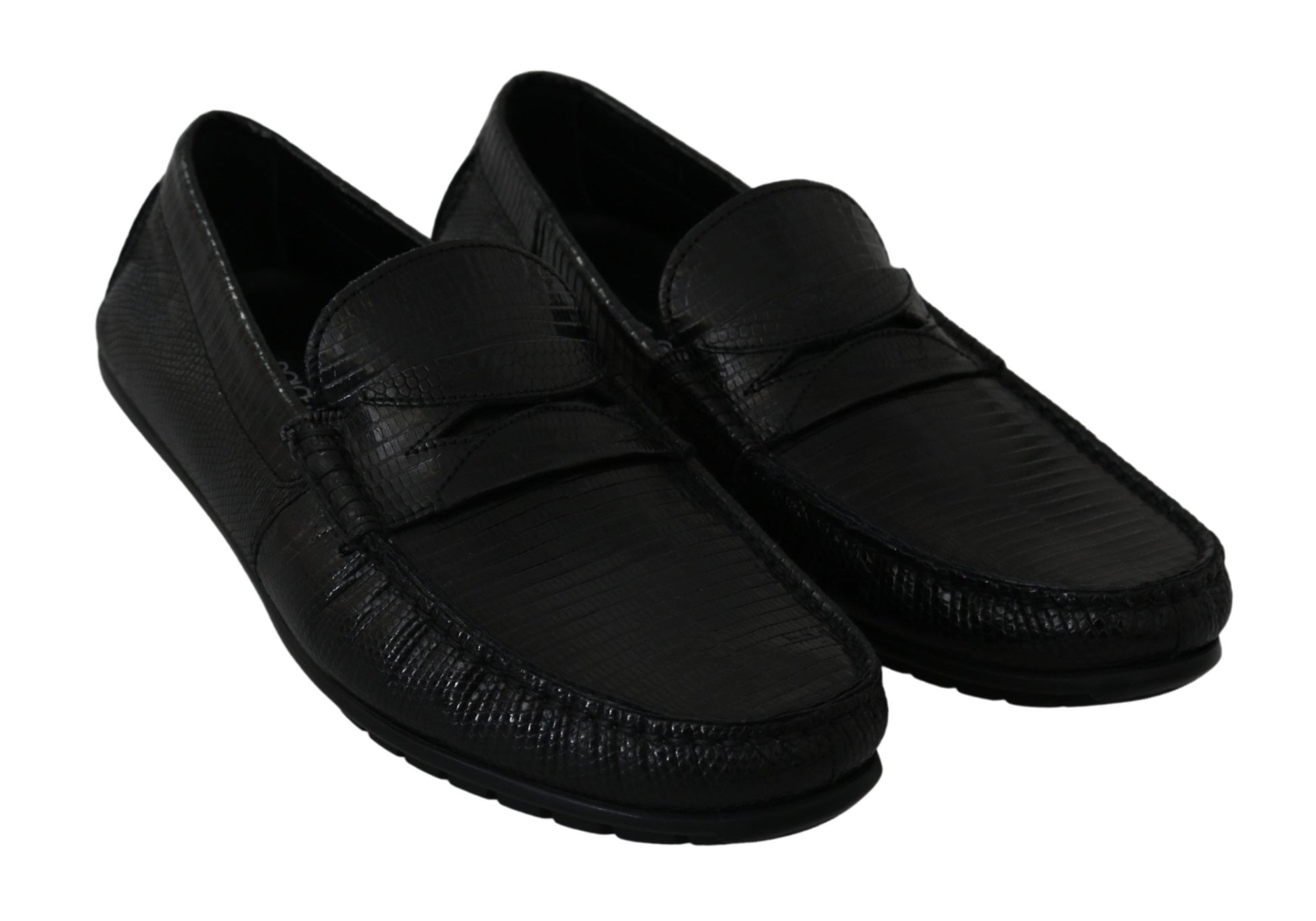 Pair of black loafers with a strap across the top