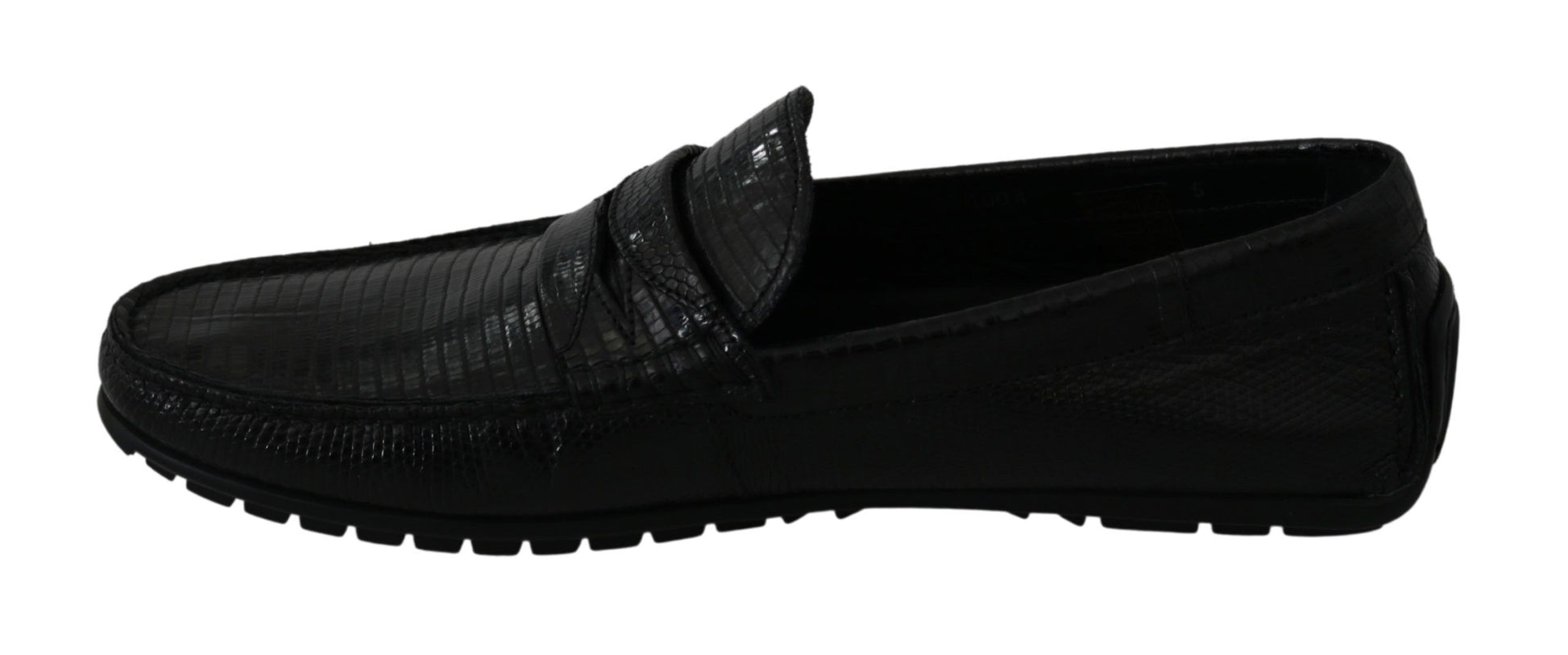 Pair of black loafers with a bow on top and a strap across the foot