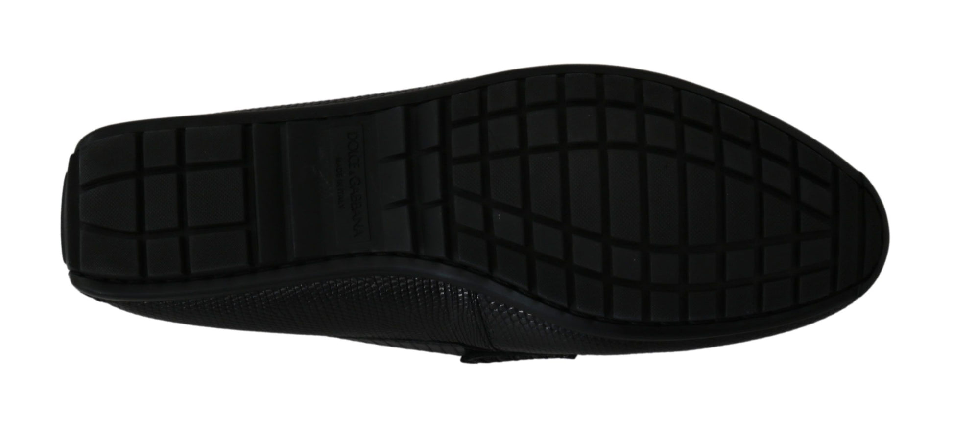 Black shoe with a white sole