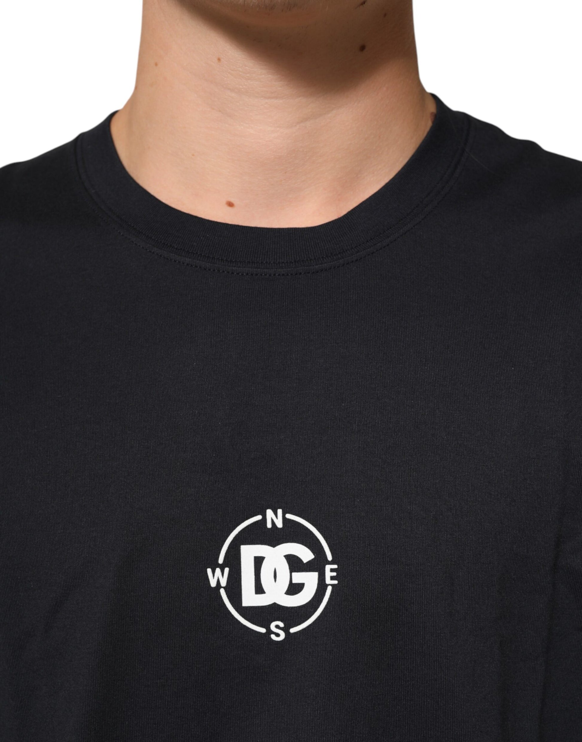 Navy blue shirt with white logo on front