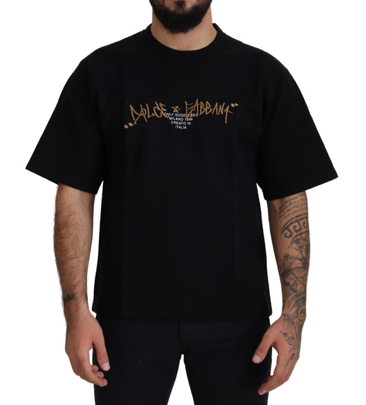 Black t-shirt with yellow writing on front