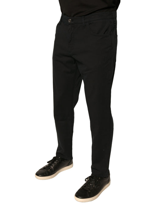 Pair of black trousers with a zippered front pocket