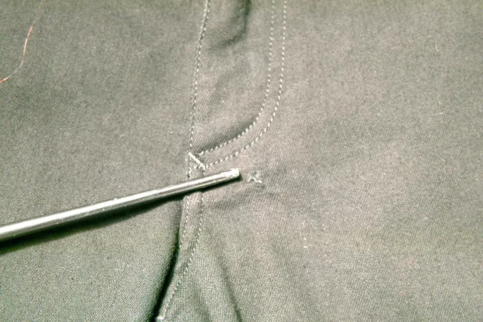 Sewing needle in fabric