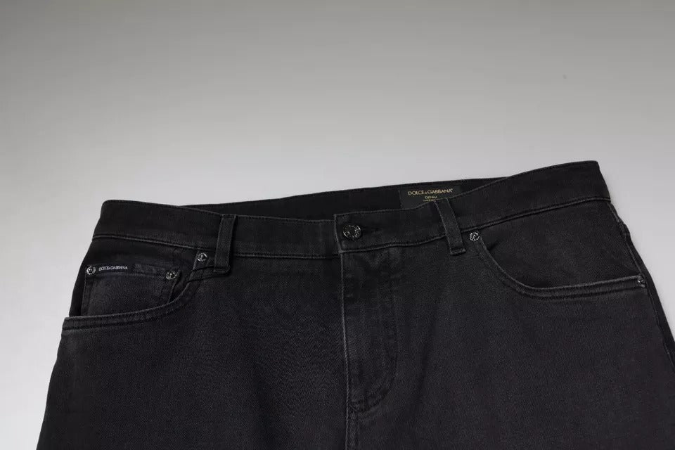 Pair of black jeans on a white surface