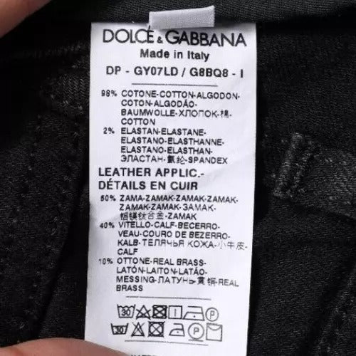 White tag on jeans with black lettering