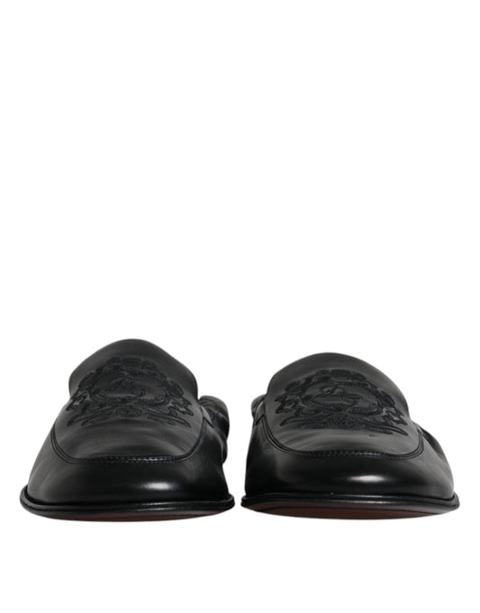 Pair of black dress shoes with laces