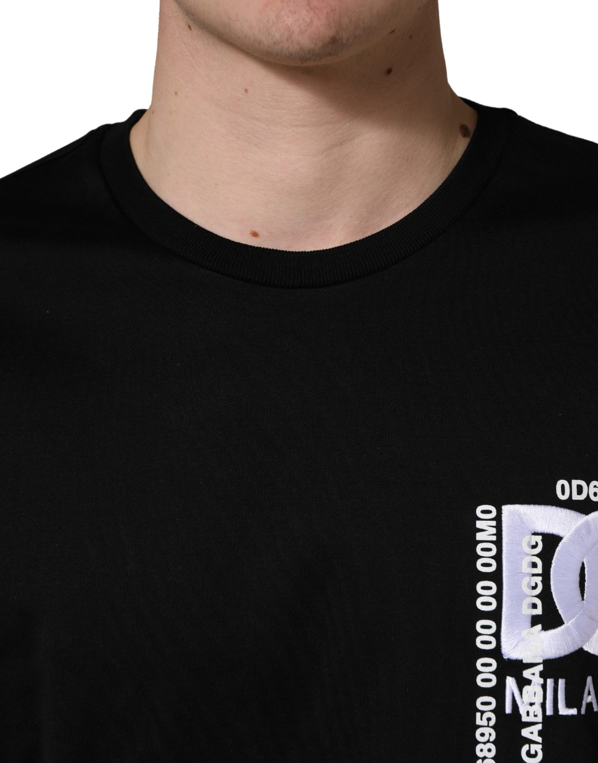 Black t-shirt with white lettering on front
