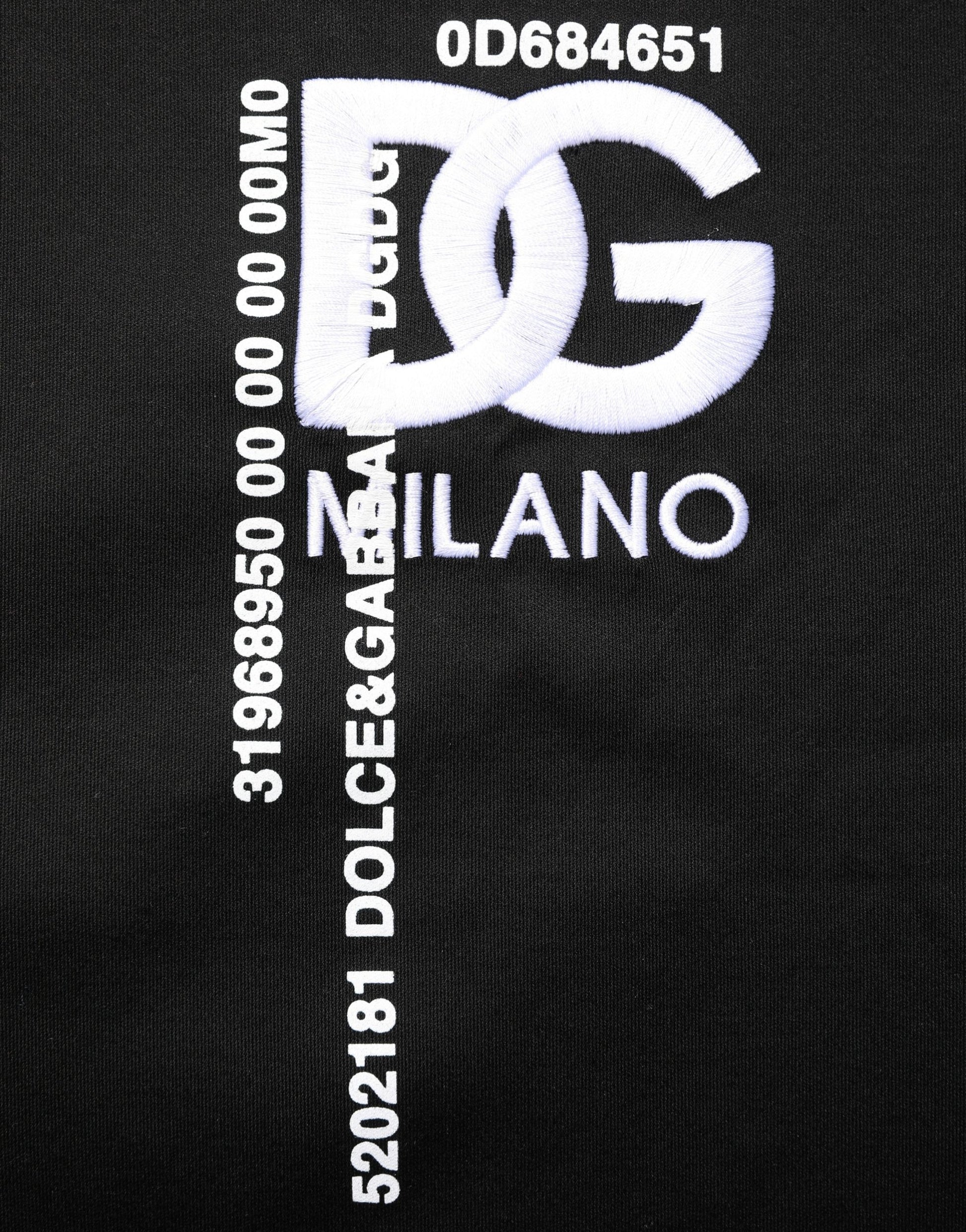 Black fabric with white embroidered letters