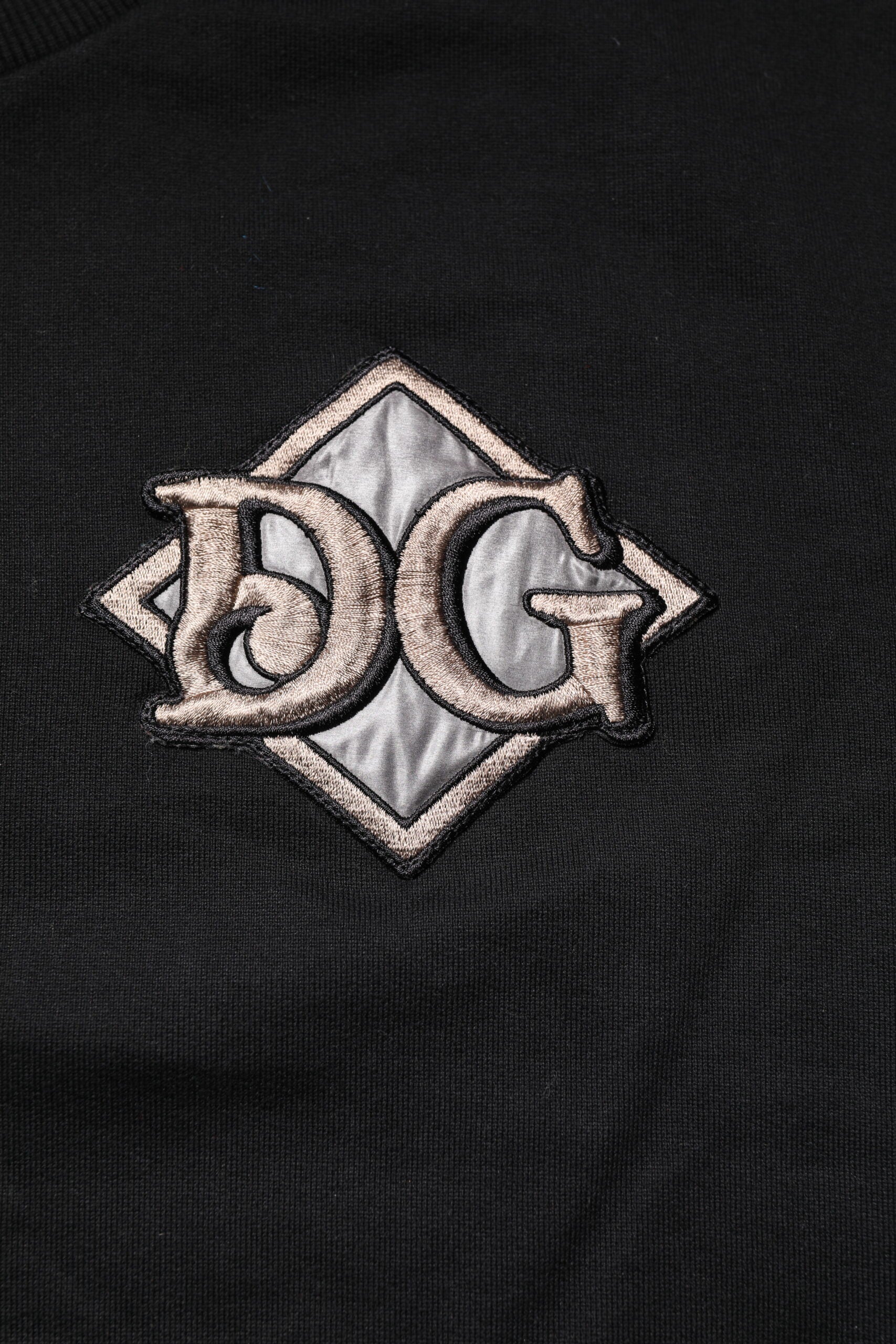 Black fabric with embroidered logo