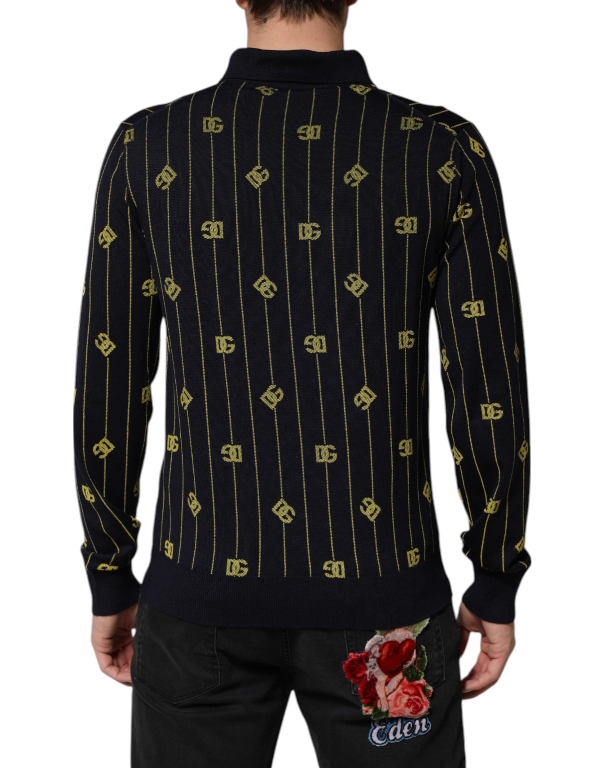 Man wearing a sweater with yellow and black pattern