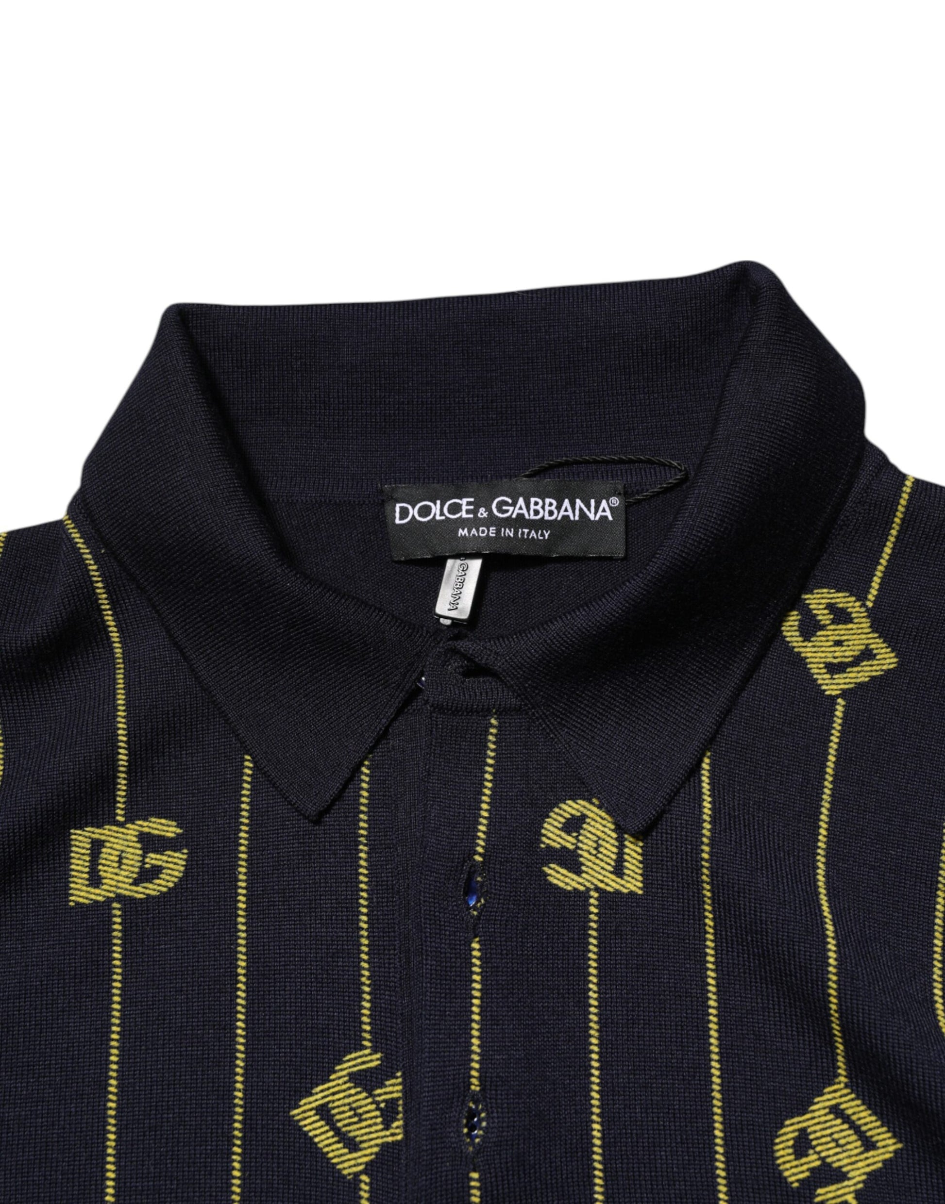 Black polo shirt with yellow letters on collar