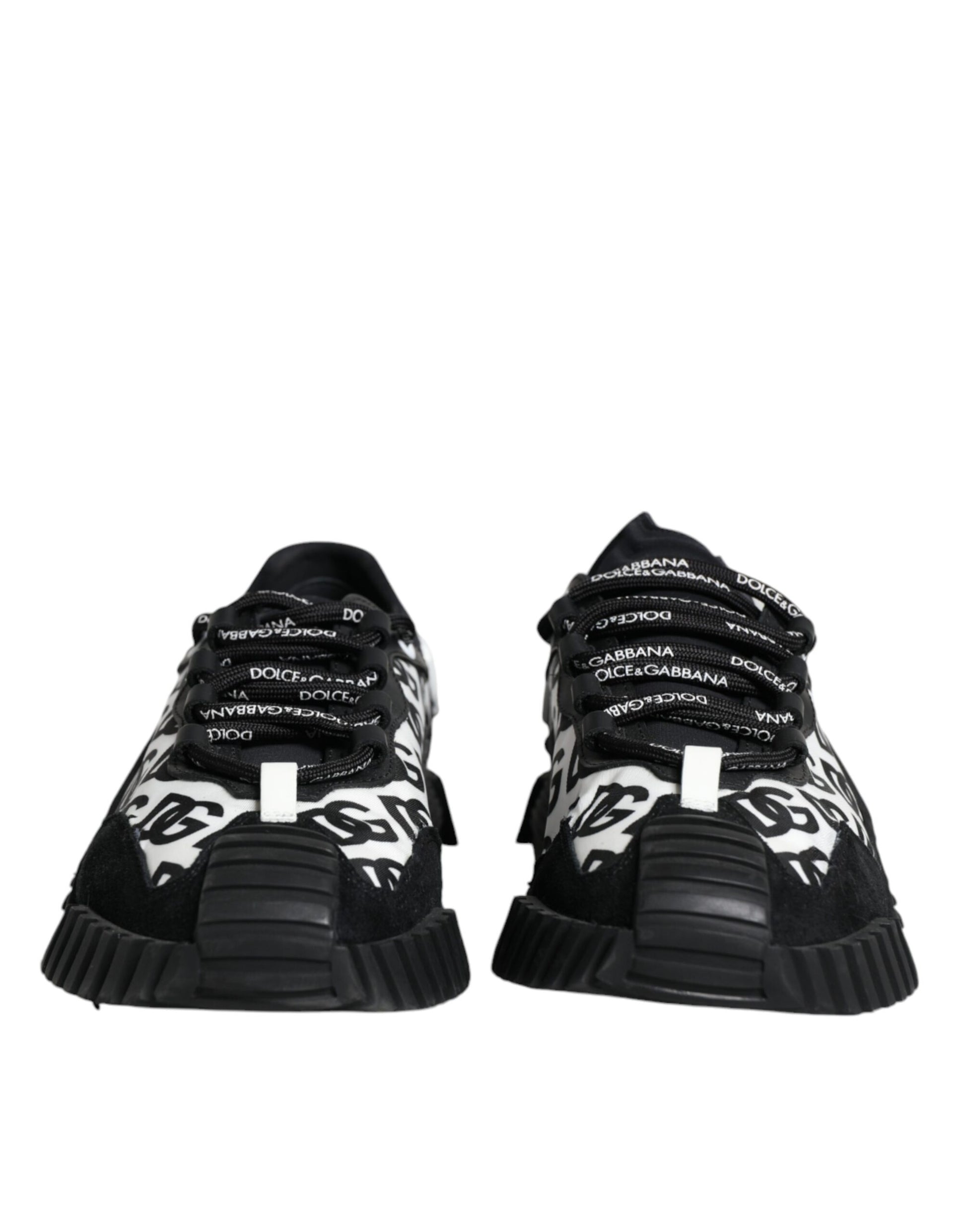 Pair of black lace-up sneakers with white logo on side
