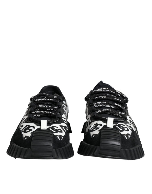 Pair of black lace-up sneakers with white logo on side