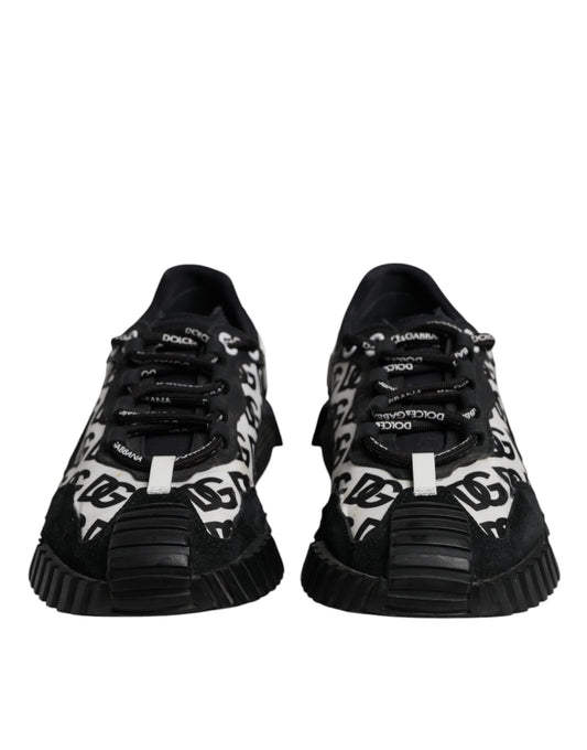 Pair of black sneakers with white laces and patterned design on side