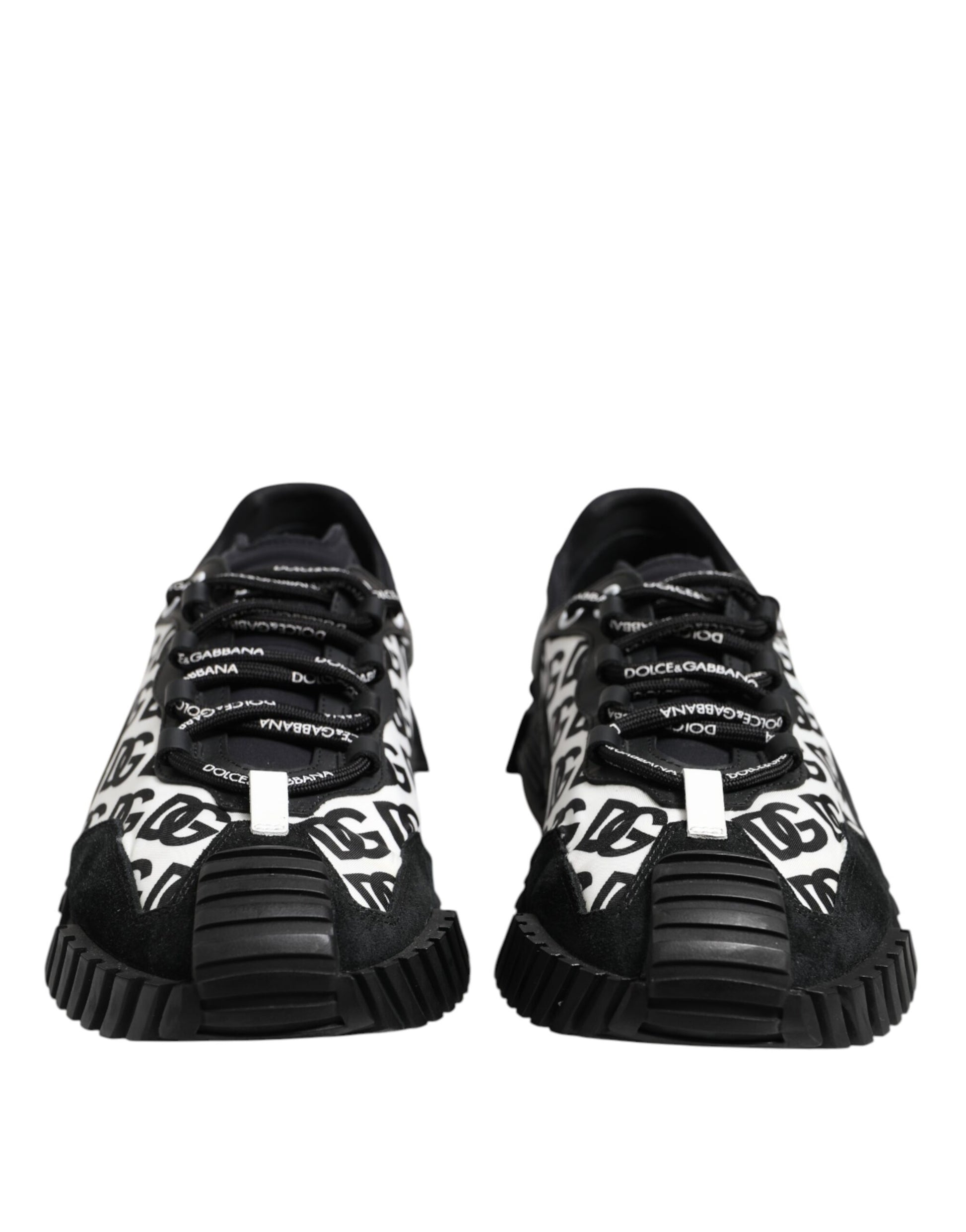 Pair of black and white sneakers with laces