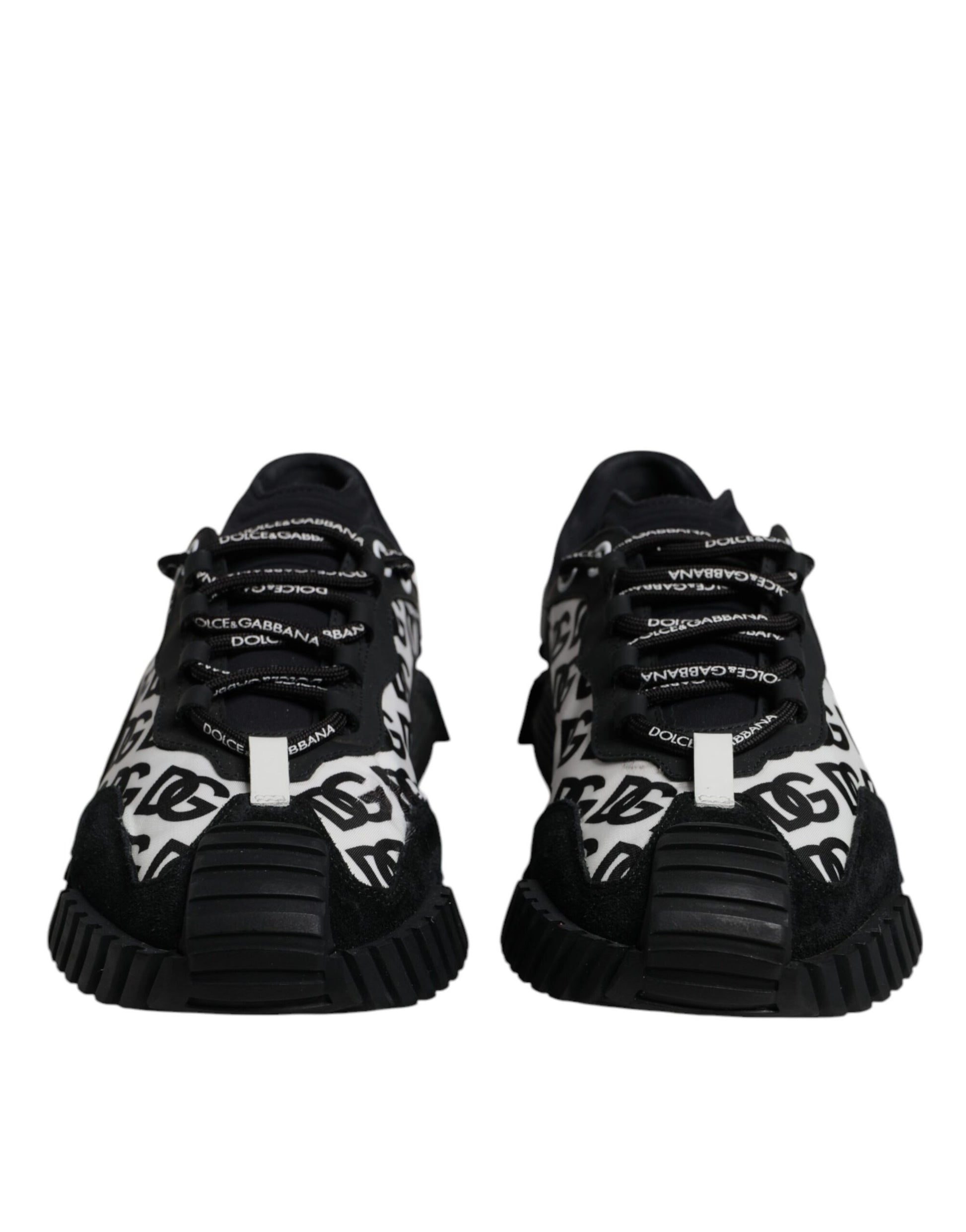 Pair of black lace-up sneakers with white logo and text