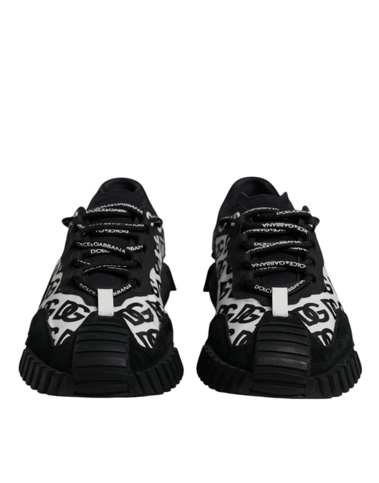 Pair of black lace-up sneakers with white logo and text