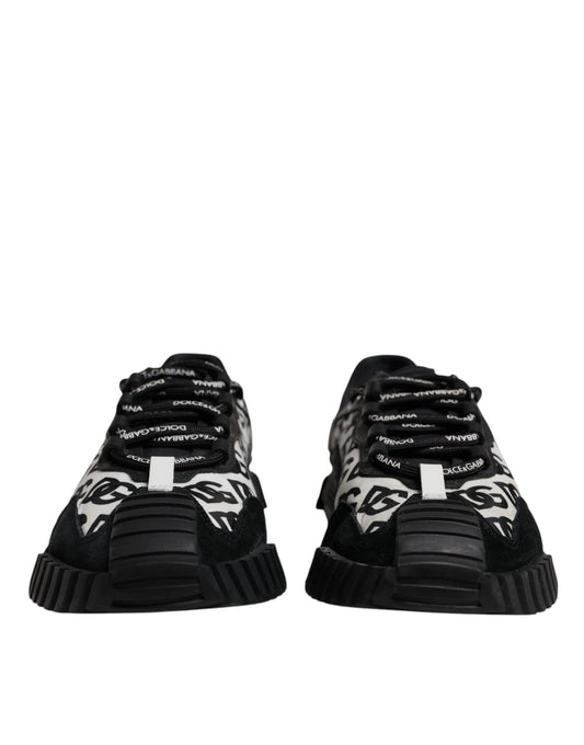 Pair of black sneakers with white laces