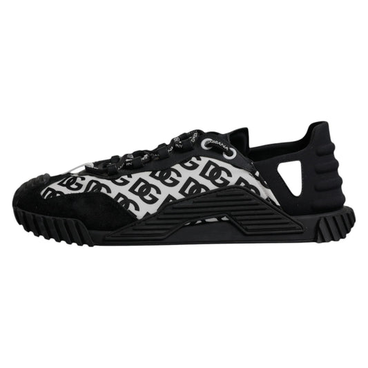 A pair of black lace-up sneakers with a white logo pattern on the side