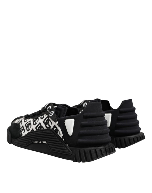 Pair of black and white athletic shoes with a patterned design on the side