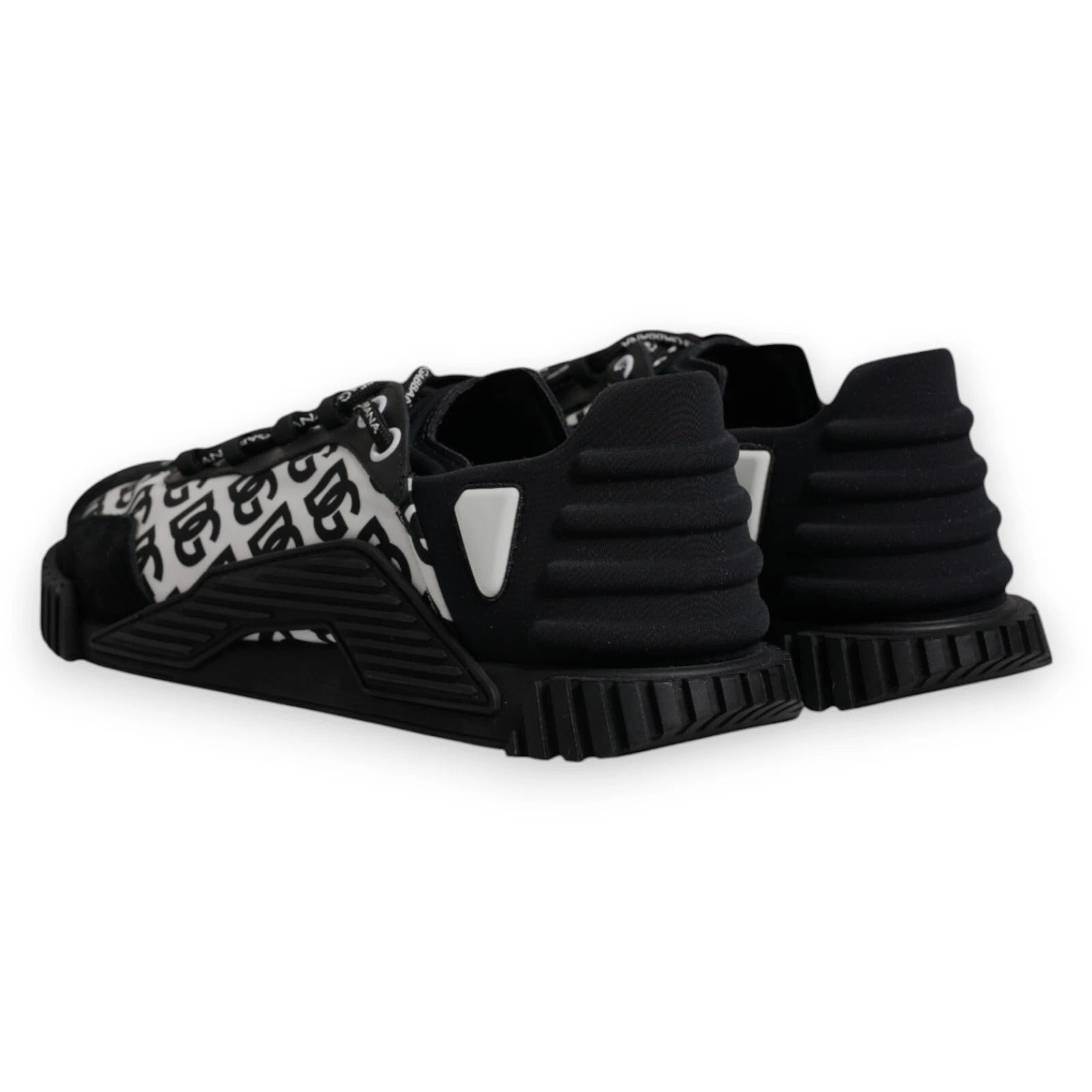 A pair of black lace-up sneakers with a logo on the side, featuring a chunky sole design