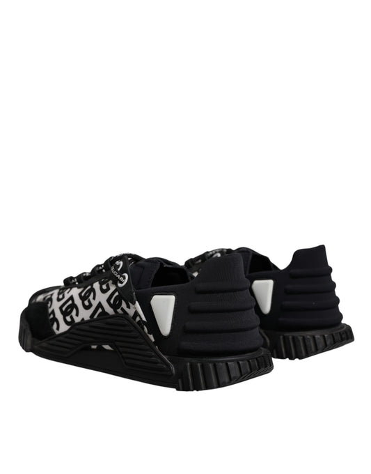 Pair of black and white sneakers with patterned design on side