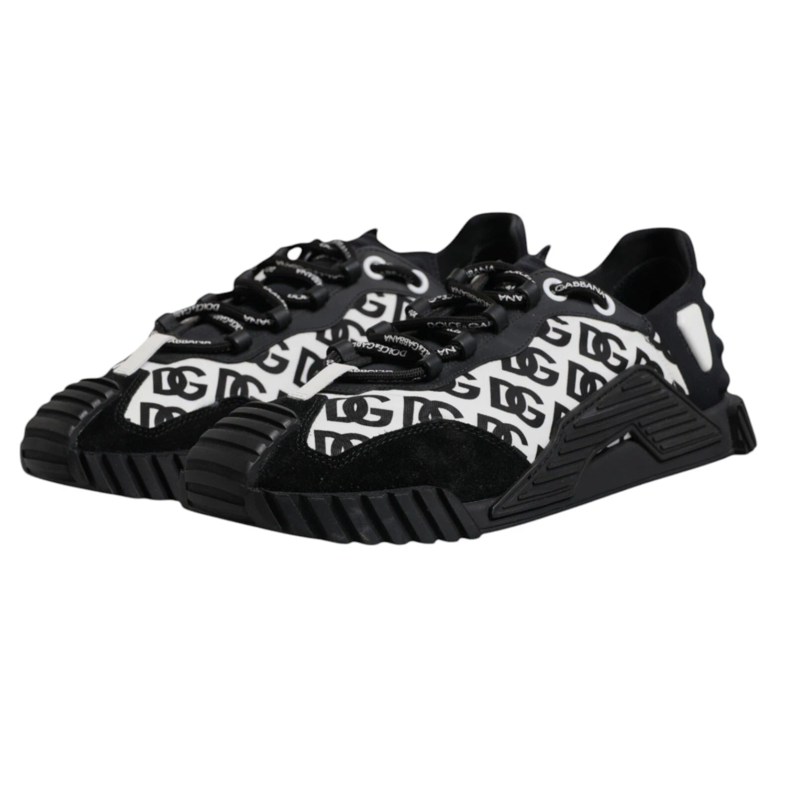 A pair of black lace-up sneakers with white logo detailing and a chunky sole