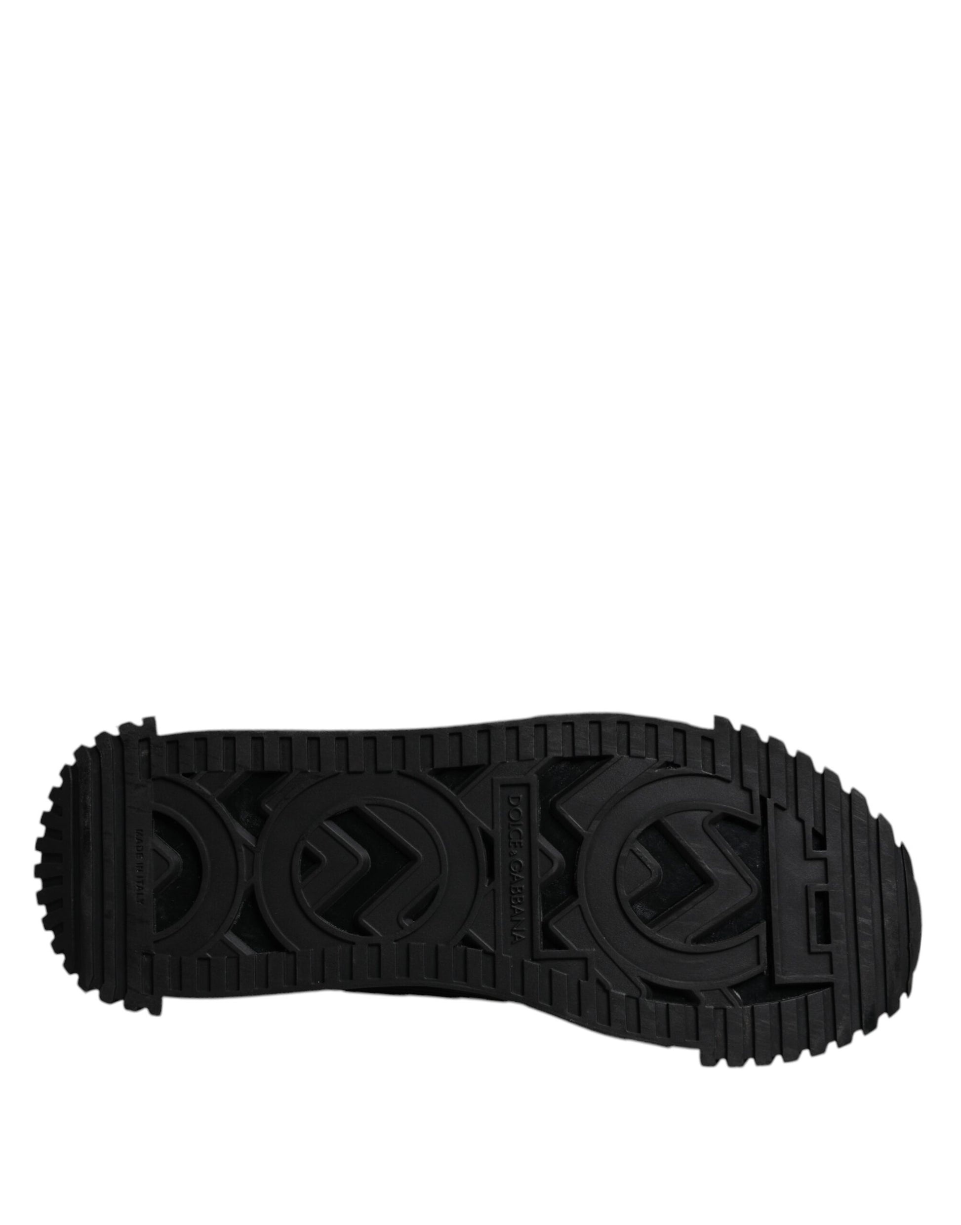 A pair of black lace-up sneakers with a logo on the side