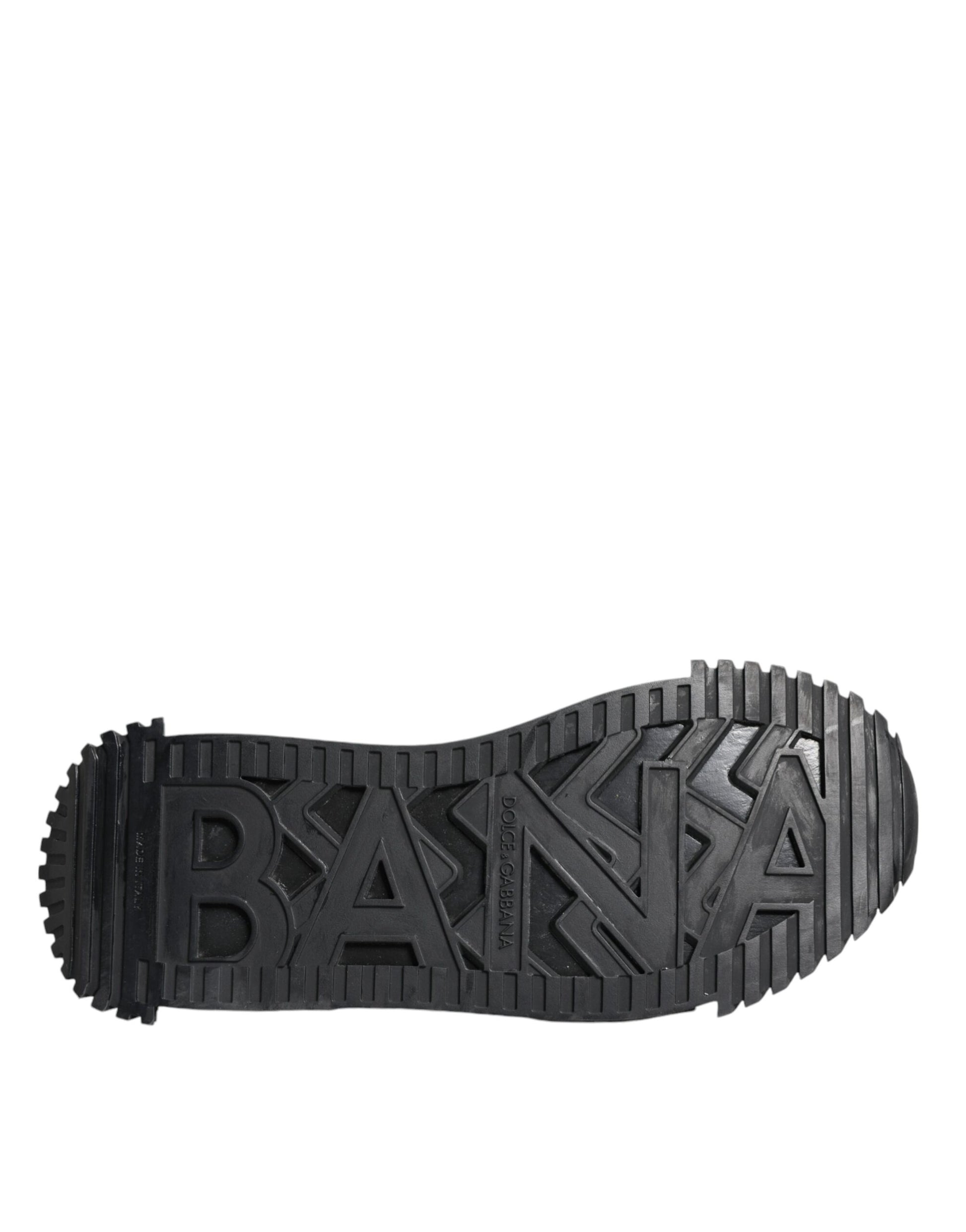 A black lace-up shoe with a logo on the side