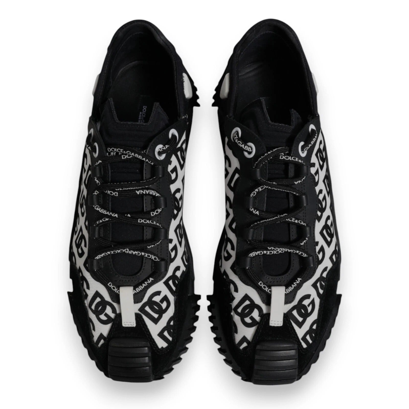 Pair of black lace-up sneakers with white logo and design elements on side