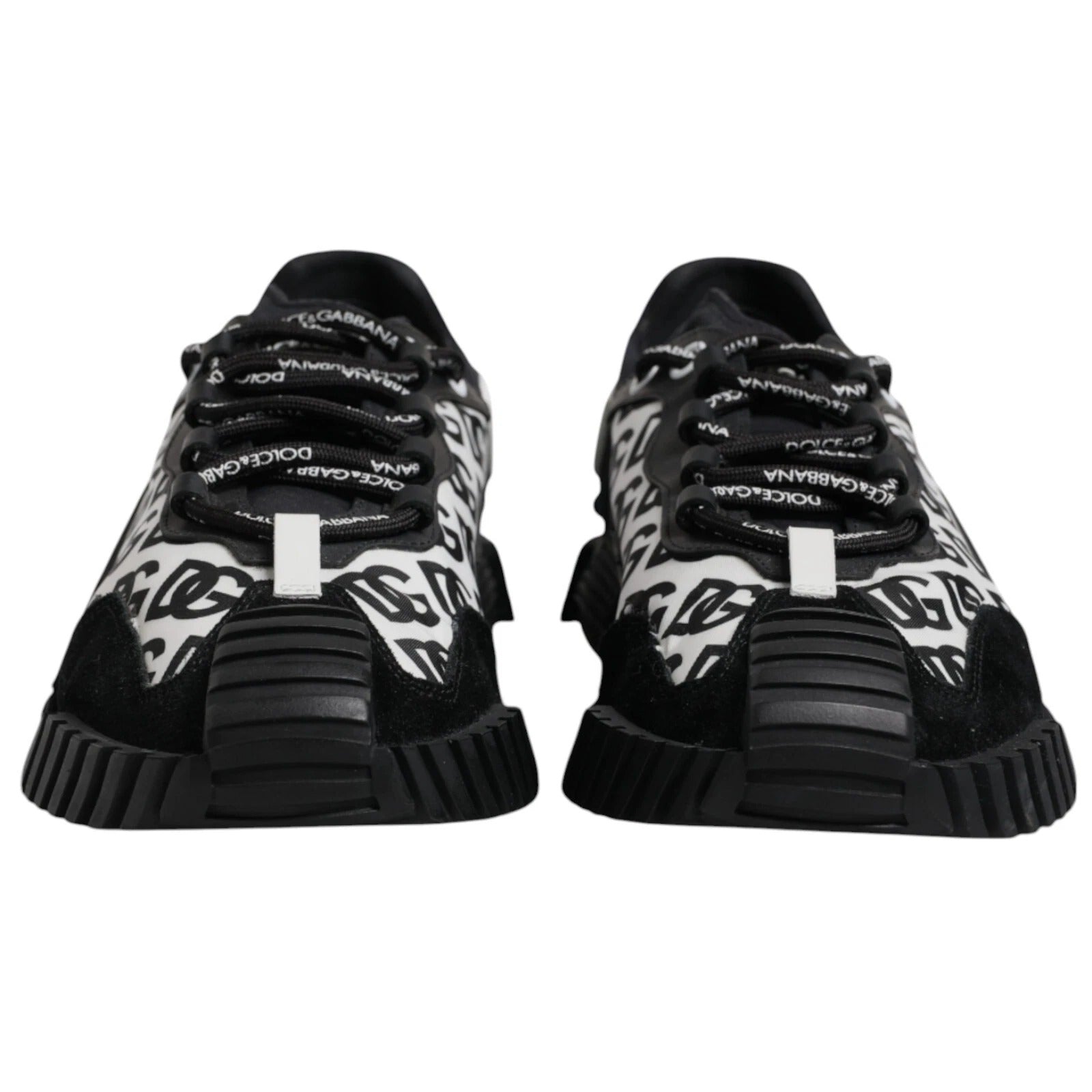 A pair of black lace-up sneakers with white logo text and a white sole